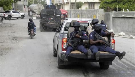 Curfew in Jamaica district after gunmen wound 7 boarding bus